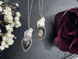 Howling Wolf Silversheen Pendants